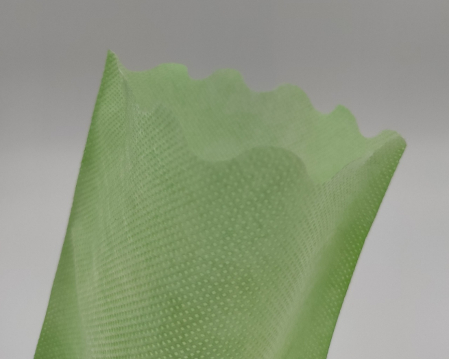 Sacchetto tessuto non tessuto verde acqua, bordo smerlato, confezione da 25 pezzi